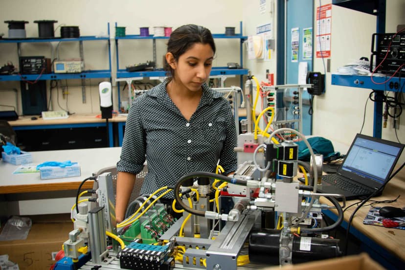 Student in Mechatronics lab equipment